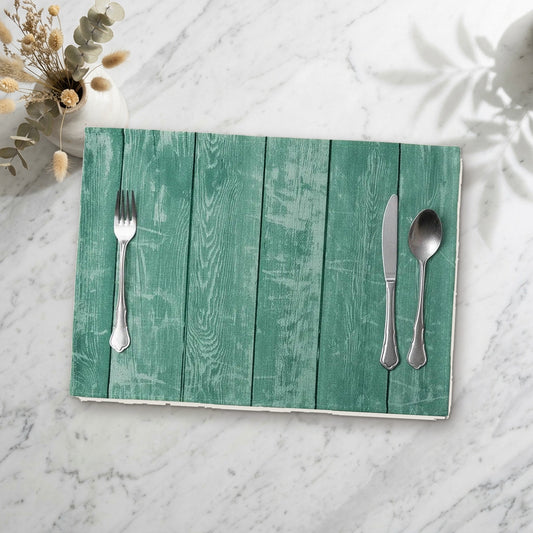 Set de table bois exotique posé sur une table en marbre